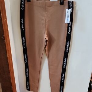 Calvin Klein Tan Leggings with Black Logo Side Stripes.  New